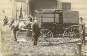The Gospel Wagon Mission parked at residence of Dr. Hibbert Woodbury. Mr. Turnball is on the left and Mr. Herd is on the right